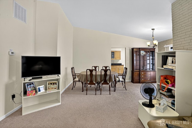 29 Whittney Ct, East Brunswick, NJ 08816 - carpeted dining room featuring a chandelier and lofted ceiling