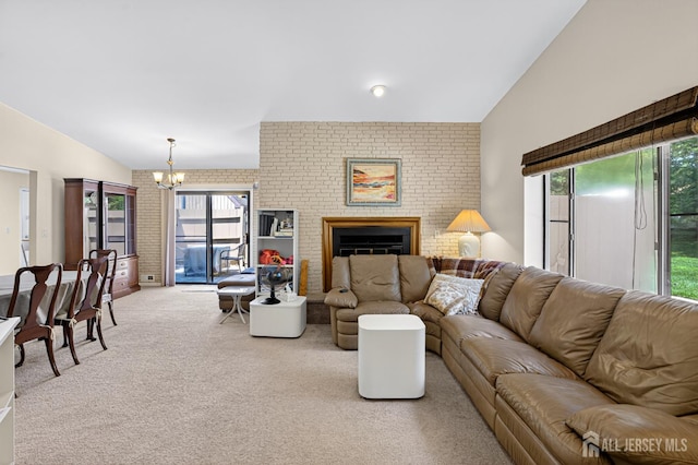 29 Whittney Ct, East Brunswick, NJ 08816 - carpeted living room with lofted ceiling, a chandelier, healthy amount of natural light, and a fireplace