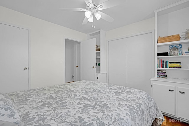 bedroom featuring a closet and a ceiling fan