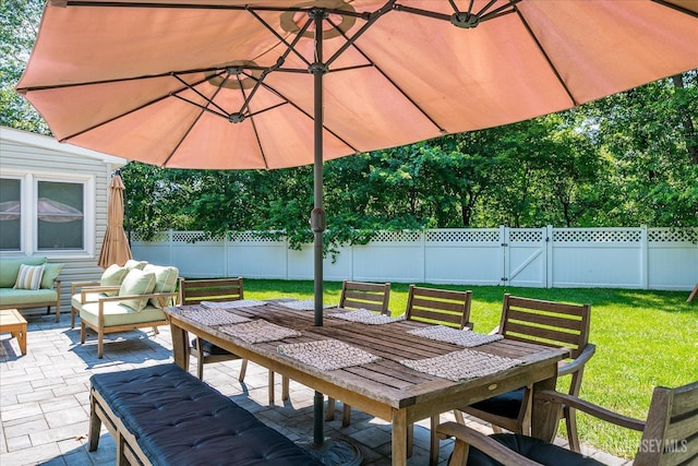 24 Turner Ct, Metuchen, NJ 08840 - fenced backyard featuring a patio area, outdoor dining area, and outdoor lounge area
