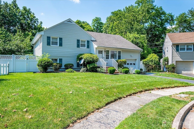 24 Turner Ct, Metuchen, NJ 08840 - split level home featuring a garage and driveway