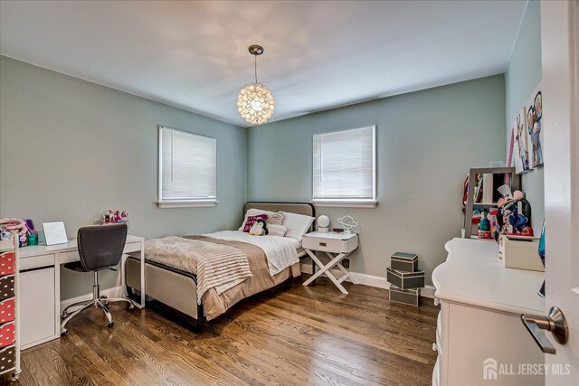 24 Turner Ct, Metuchen, NJ 08840 - bedroom with multiple windows and dark wood finished floors