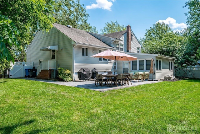 24 Turner Ct, Metuchen, NJ 08840 - back of property with a gate, a patio, and a shingled roof