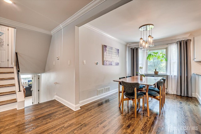 24 Turner Ct, Metuchen, NJ 08840 - dining area featuring dark wood-style floors, stairway, crown molding, and a chandelier