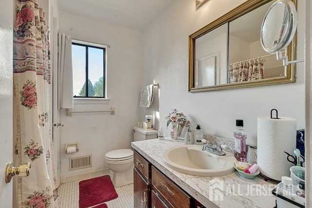 39 Gary Ct, South Brunswick, NJ 08810 - full bath featuring vanity, toilet, tile patterned flooring, a shower with curtain, and baseboards