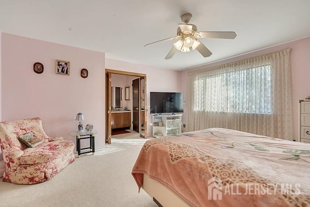 39 Gary Ct, South Brunswick, NJ 08810 - carpeted bedroom featuring a ceiling fan and ensuite bath