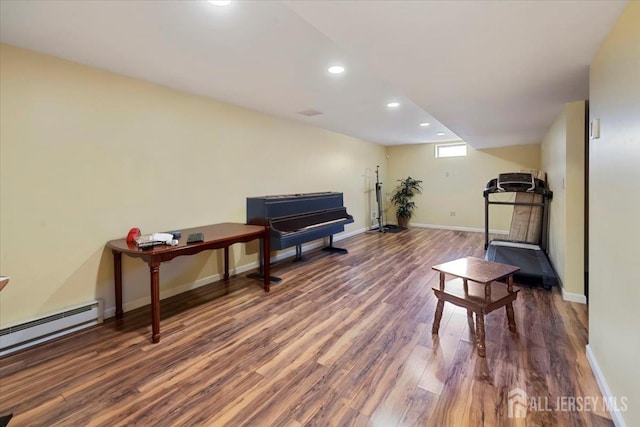 861 S Birch St S, Perth Amboy, NJ 08861 - sitting room with wood finished floors, recessed lighting, baseboards, and a baseboard radiator