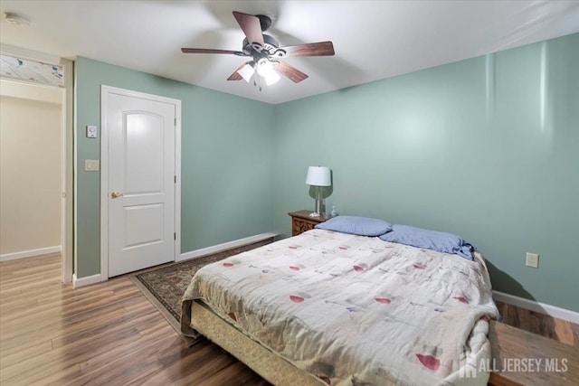 861 S Birch St S, Perth Amboy, NJ 08861 - bedroom featuring wood finished floors, baseboards, and ceiling fan
