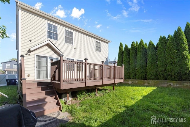 861 S Birch St S, Perth Amboy, NJ 08861 - rear view of house featuring a deck and a yard