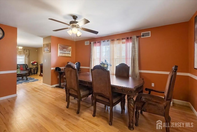 861 S Birch St S, Perth Amboy, NJ 08861 - dining space with baseboards, light wood-type flooring, and ceiling fan