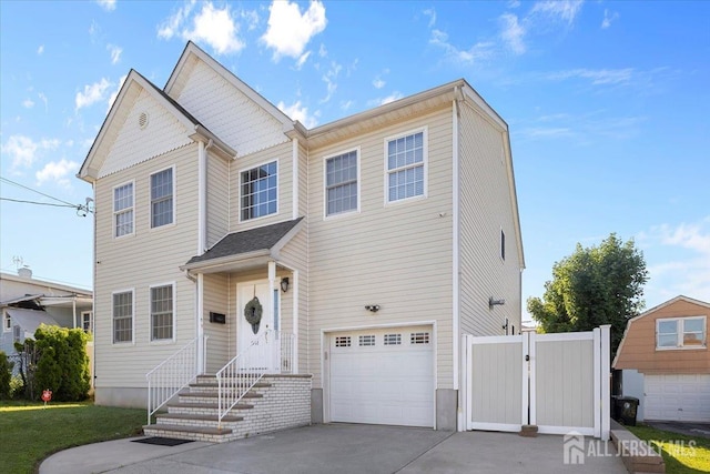 861 S Birch St S, Perth Amboy, NJ 08861 - view of front facade with an attached garage and concrete driveway