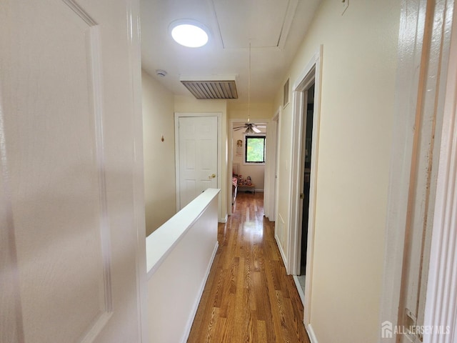 74 Probasco Rd, East Windsor, NJ 08520 - hall with attic access, wood finished floors, and an upstairs landing