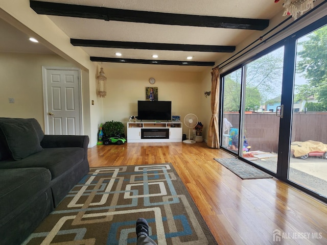 74 Probasco Rd, East Windsor, NJ 08520 - living area featuring wood finished floors, beam ceiling, and recessed lighting
