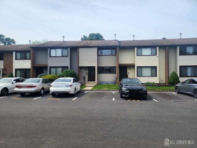 74 Probasco Rd, East Windsor, NJ 08520 - view of building exterior with uncovered parking
