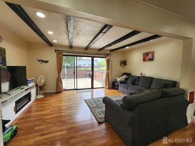74 Probasco Rd, East Windsor, NJ 08520 - living area featuring beamed ceiling, light wood-type flooring, and recessed lighting