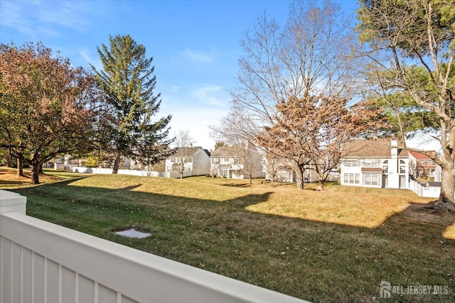 view of yard with a residential view