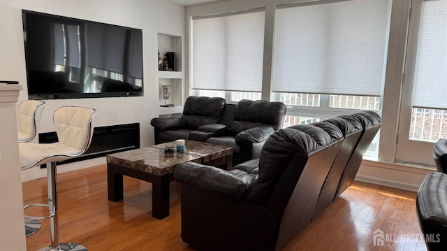 living room with wood finished floors