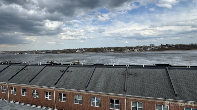 368 Rector St Unit 512, Perth Amboy, NJ 08861 - exterior view of a downspout, gutters, and roof with shingles