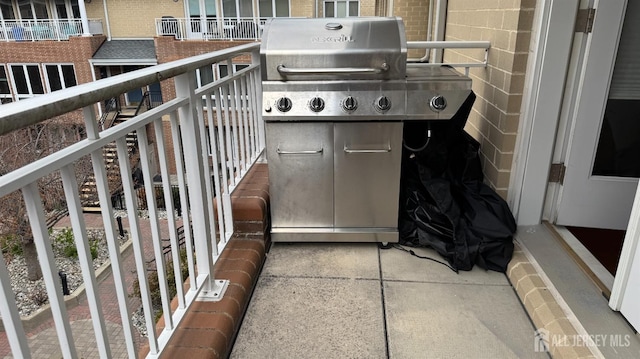 balcony featuring area for grilling