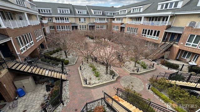 view of community with fence
