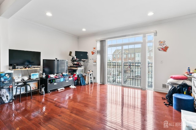playroom featuring recessed lighting, wood-type flooring, and crown molding