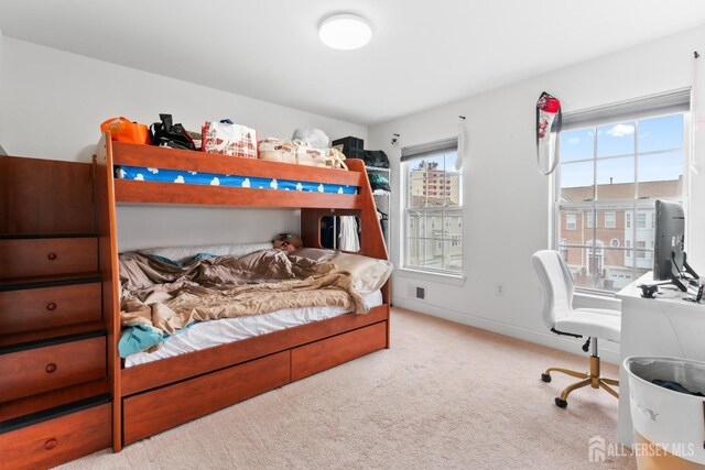 bedroom featuring carpet flooring and visible vents