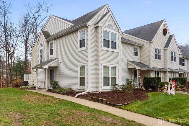 view of front of property with a front lawn