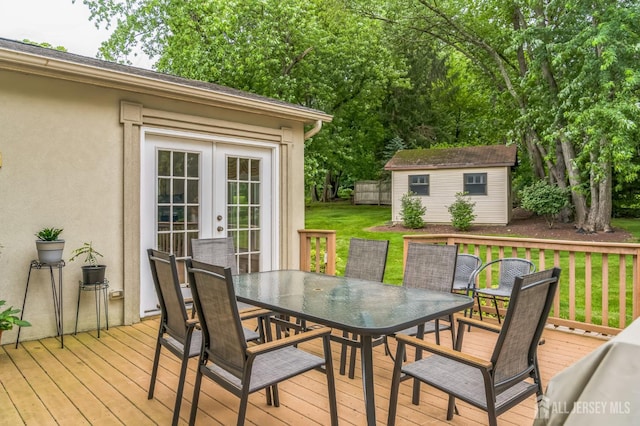 14 Greensview Dr, Scotch Plains, NJ 07076 - wooden terrace with outdoor dining area, french doors, a lawn, and a shed