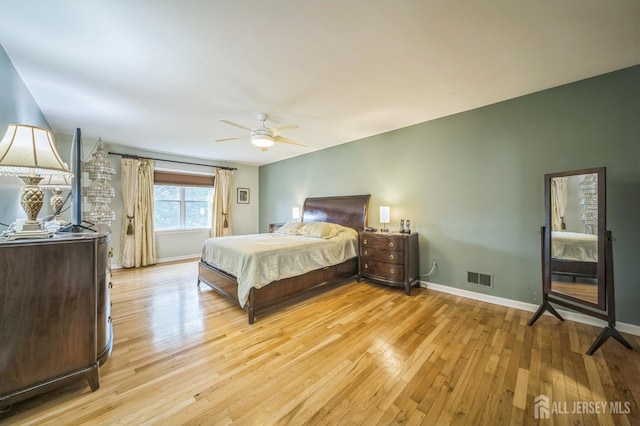 14 Greensview Dr, Scotch Plains, NJ 07076 - bedroom with light wood-style floors and a ceiling fan