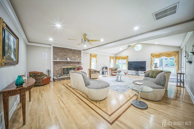 14 Greensview Dr, Scotch Plains, NJ 07076 - living area with a ceiling fan, wood finished floors, a brick fireplace, lofted ceiling, and recessed lighting