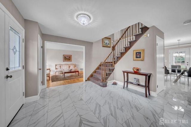 14 Greensview Dr, Scotch Plains, NJ 07076 - entrance foyer featuring stairway and marble look tile flooring