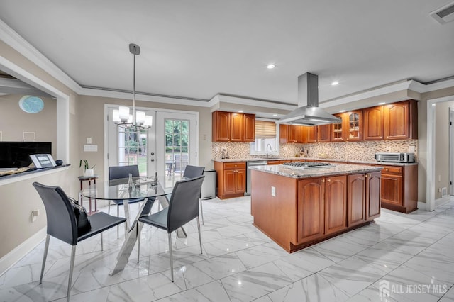 14 Greensview Dr, Scotch Plains, NJ 07076 - kitchen featuring island exhaust hood, brown cabinetry, stainless steel appliances, crown molding, and light marble finish floors