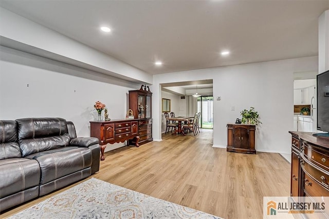 7402 Hana Rd, Edison, NJ 08817 - living room featuring light wood-style flooring and recessed lighting