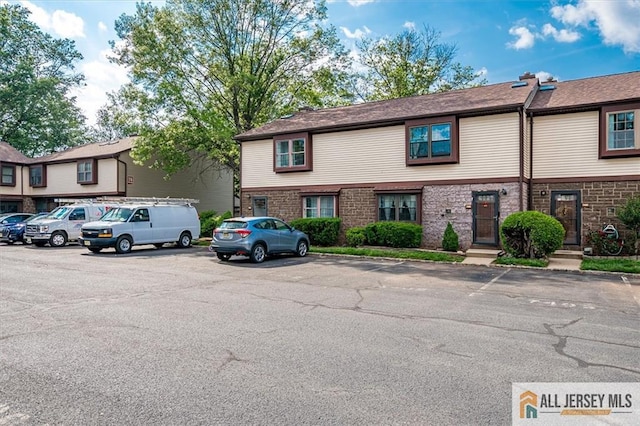 7402 Hana Rd, Edison, NJ 08817 - multi unit property featuring uncovered parking and brick siding