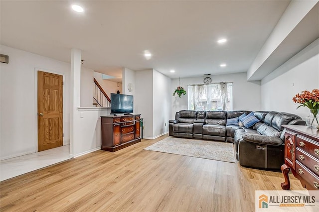 7402 Hana Rd, Edison, NJ 08817 - living area featuring light wood finished floors, stairs, and recessed lighting