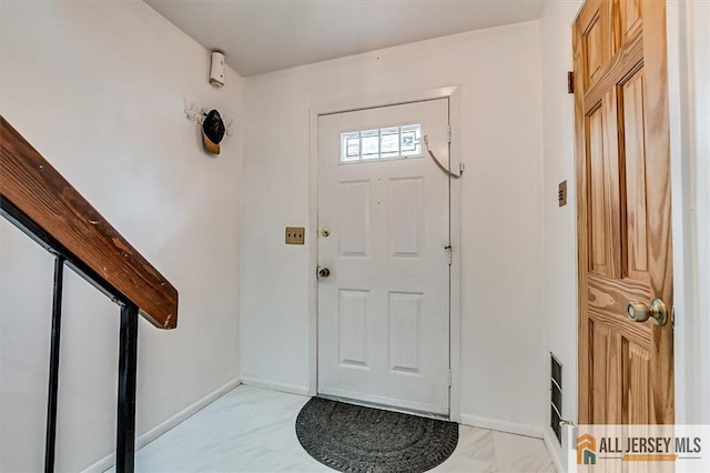 7402 Hana Rd, Edison, NJ 08817 - entrance foyer with light marble finish floors and baseboards