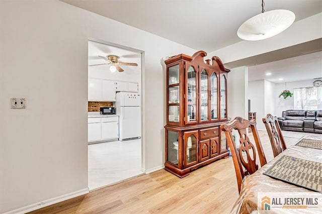 7402 Hana Rd, Edison, NJ 08817 - dining space with light wood-type flooring and a ceiling fan