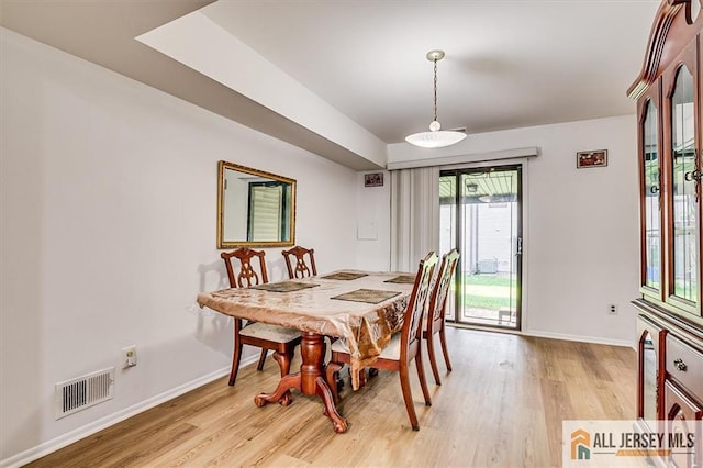 7402 Hana Rd, Edison, NJ 08817 - dining space with light wood-style flooring