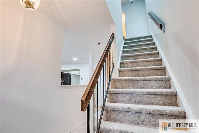 7402 Hana Rd, Edison, NJ 08817 - stairs with baseboards