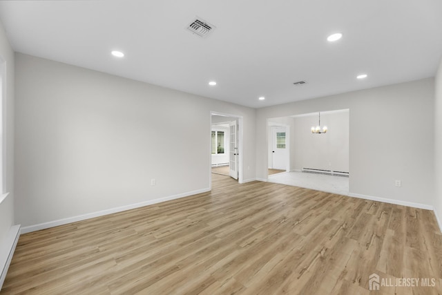 381-C Old Nassau Rd, Monroe, NJ 08831 - unfurnished room featuring a chandelier, baseboard heating, light wood-style floors, recessed lighting, and a baseboard radiator
