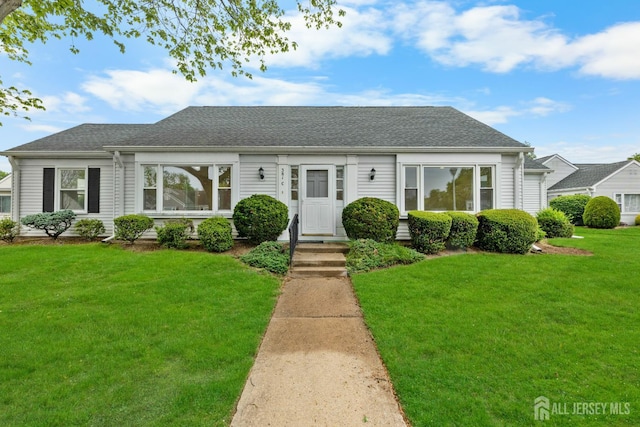 381-C Old Nassau Rd, Monroe, NJ 08831 - view of front of house with a front yard and roof with shingles