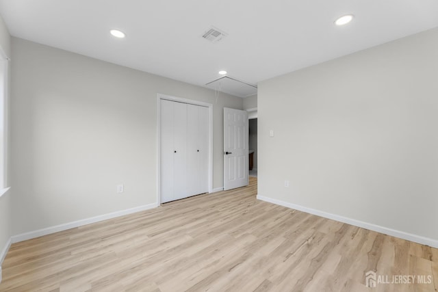 381-C Old Nassau Rd, Monroe, NJ 08831 - unfurnished bedroom featuring attic access, light wood-style flooring, a closet, and recessed lighting