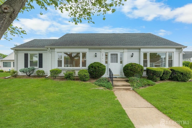 381-C Old Nassau Rd, Monroe, NJ 08831 - view of front of home with a front yard and a shingled roof