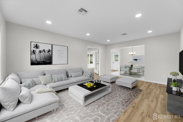 381-C Old Nassau Rd, Monroe, NJ 08831 - living area with wood finished floors, a chandelier, and recessed lighting