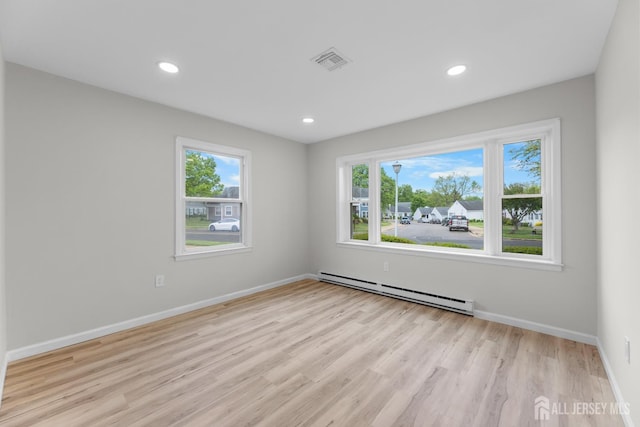 381-C Old Nassau Rd, Monroe, NJ 08831 - spare room with baseboard heating, light wood-type flooring, and recessed lighting