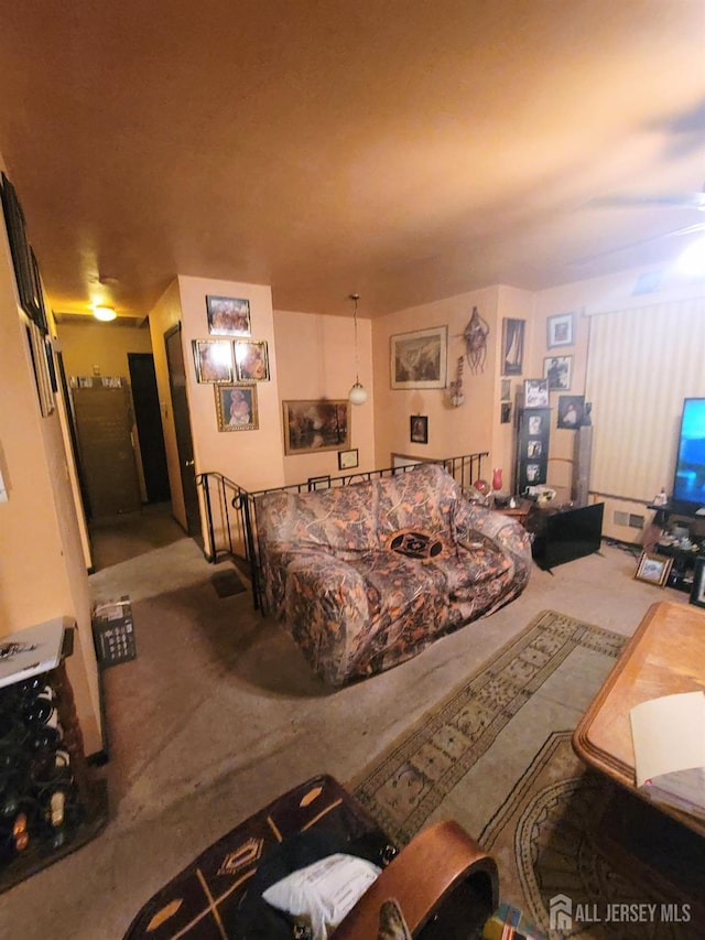 living room with ceiling fan