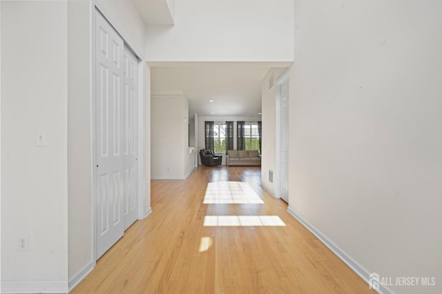 hall featuring light wood-type flooring