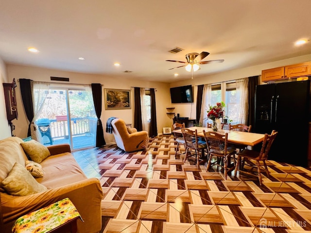 dining space with plenty of natural light, a ceiling fan, and recessed lighting