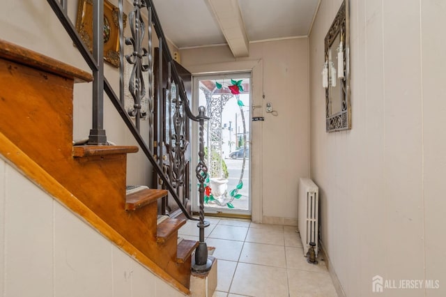 tiled entryway with radiator