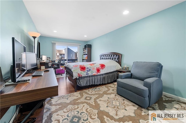 bedroom featuring wood-type flooring